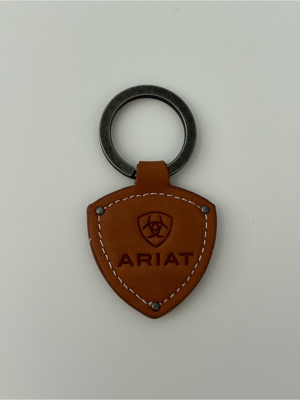 Ariat Embossed Logo Chestnut Leather Keychain 1993 Stamped Metal Key Ring
Cowboy
